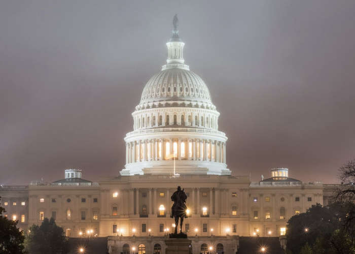 The building of the U.S. Congress at night.